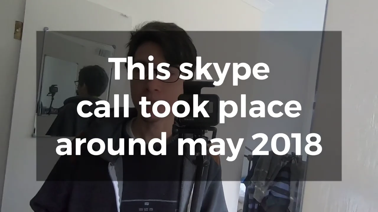 Daniel beside a small camera under a creator-added overlay reading This skype call took place around may 2018